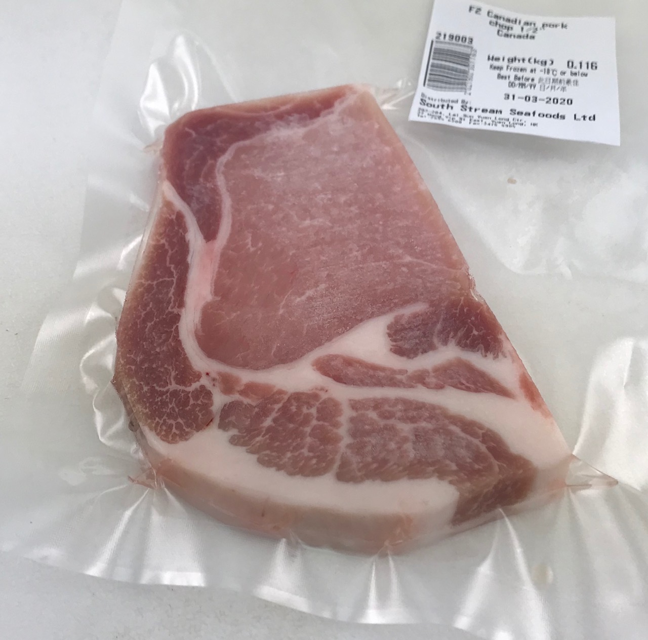 Frozen Canadian pork chop ½"